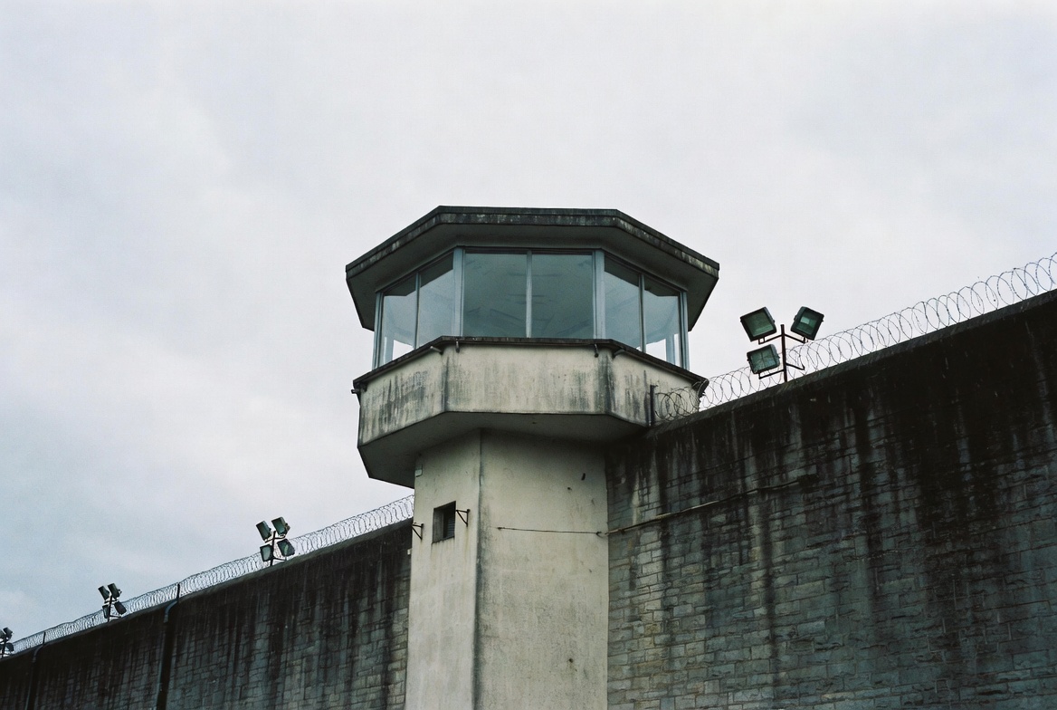 A concrete watchtower above the perimeter wall of Portlaoise Prison.